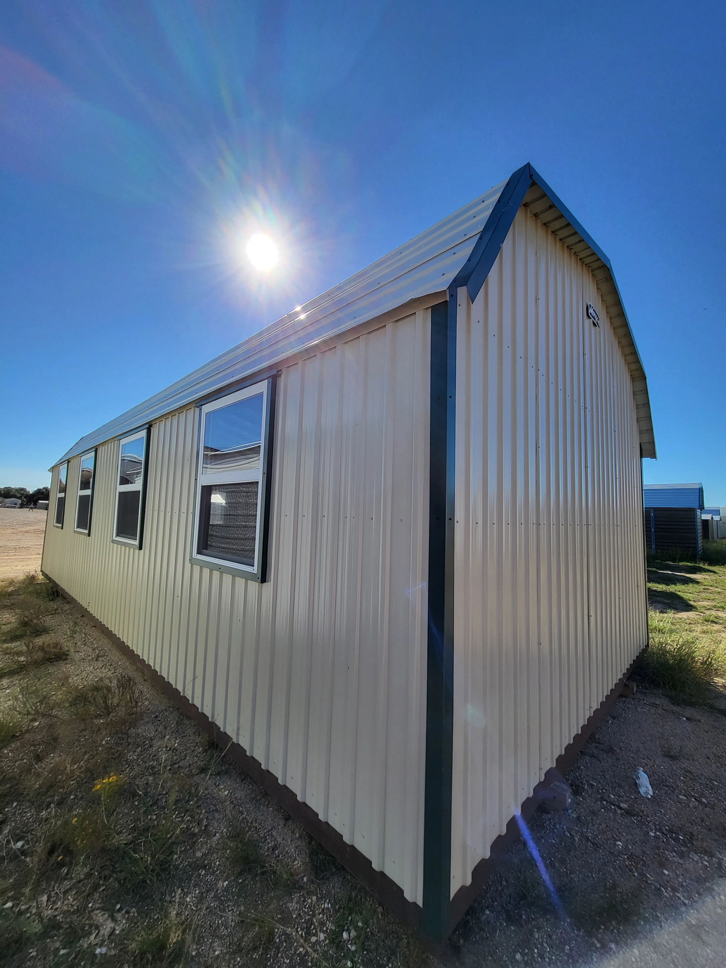 06 x 06 Steel Storage Shed in Tan Siding and Green Trim