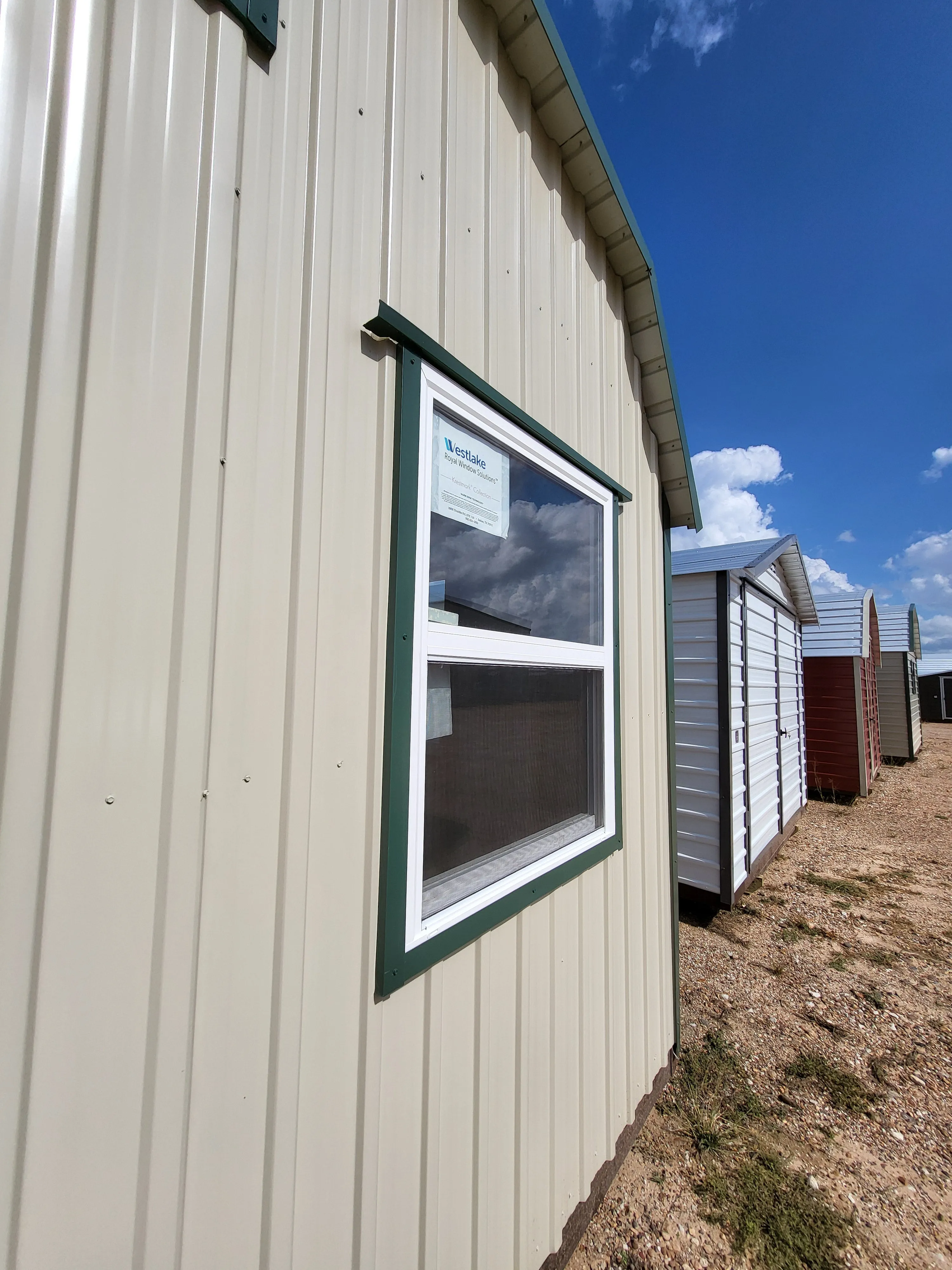 06 x 06 Steel Storage Shed in Tan Siding and Green Trim