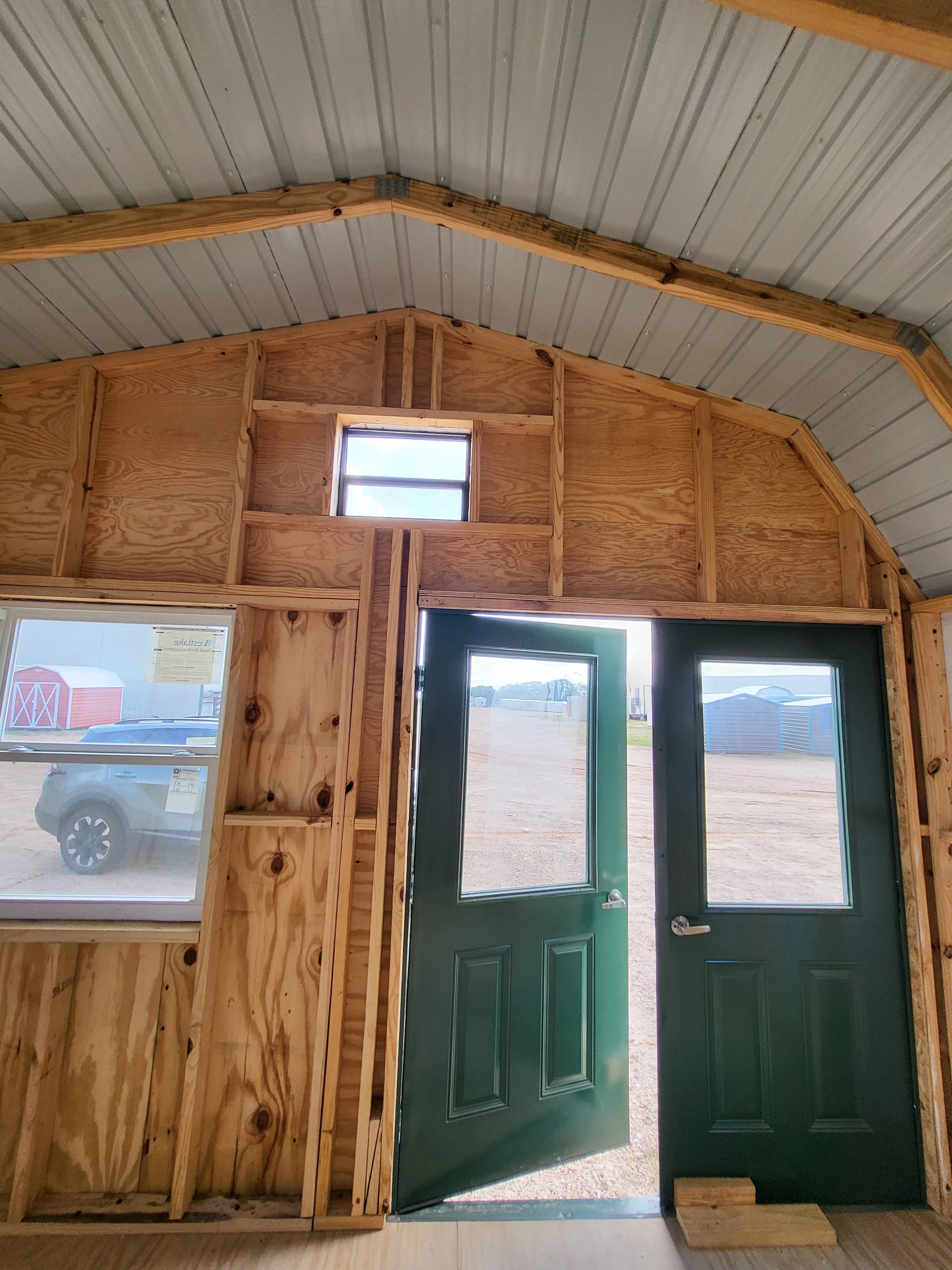 06 x 06 Steel Storage Shed in Tan Siding and Green Trim