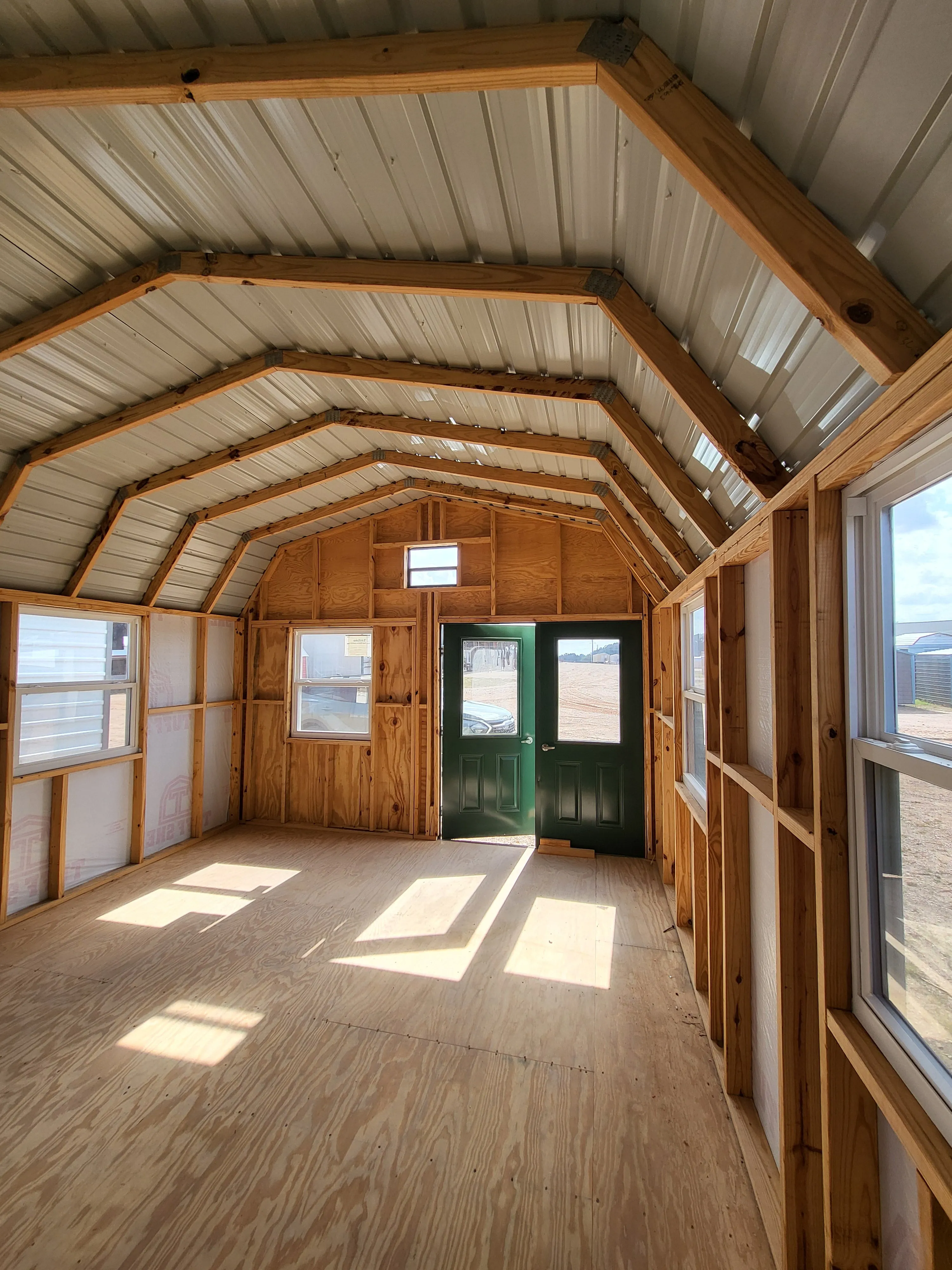 06 x 06 Steel Storage Shed in Tan Siding and Green Trim