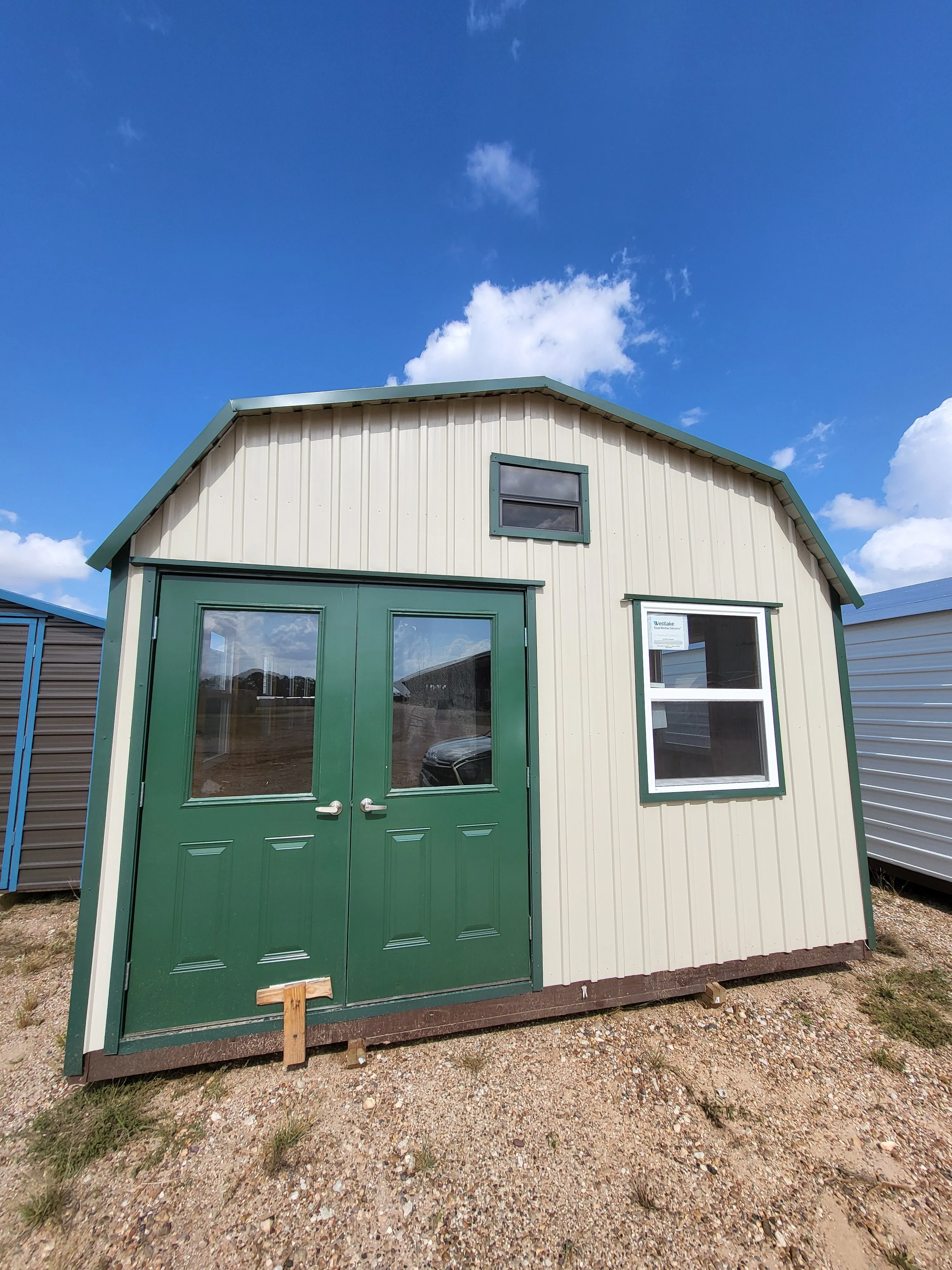 06 x 06 Steel Storage Shed in Tan Siding and Green Trim