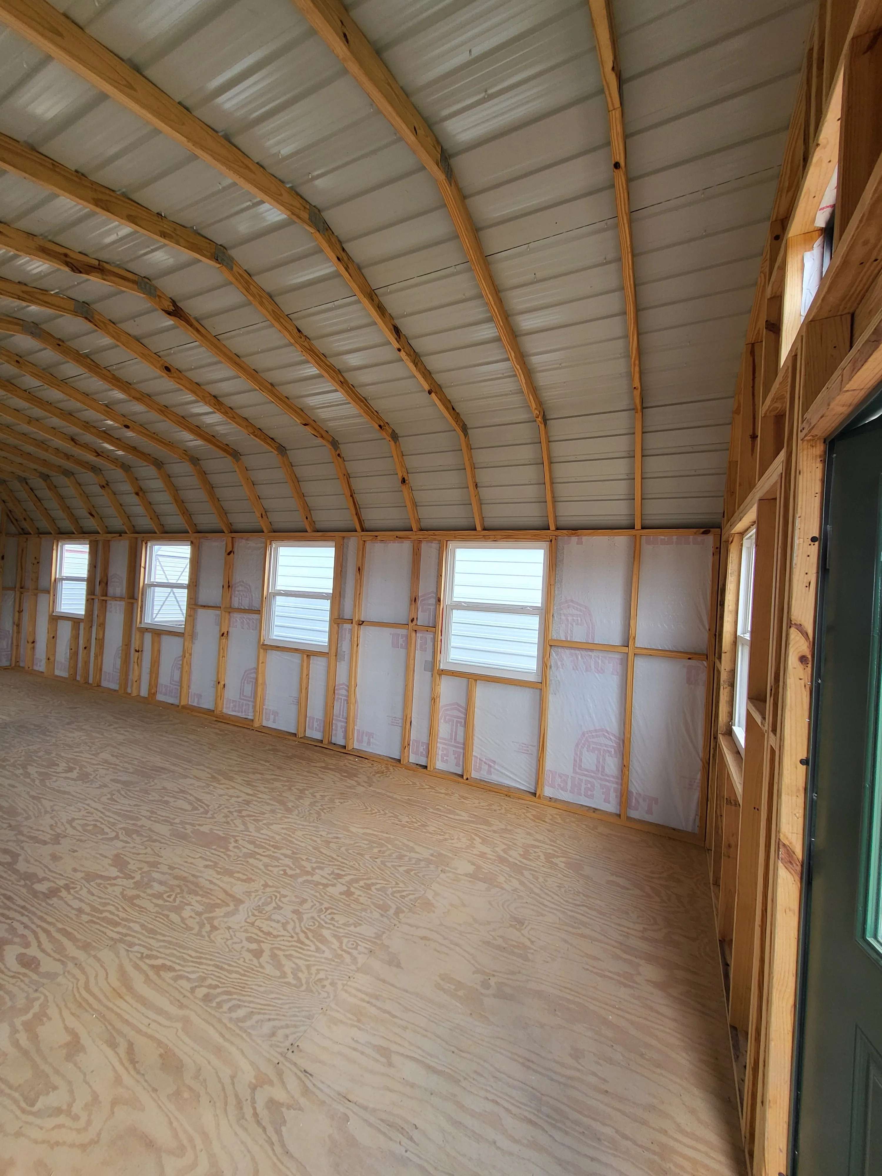 06 x 06 Steel Storage Shed in Tan Siding and Green Trim